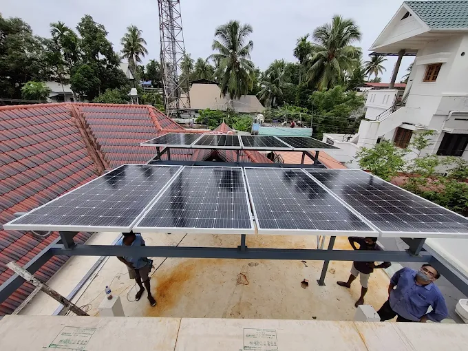 Solar expert guiding ongoing rooftop panel installation